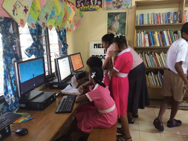 Mrs. Reddy helping her Year 8 students do additional research.