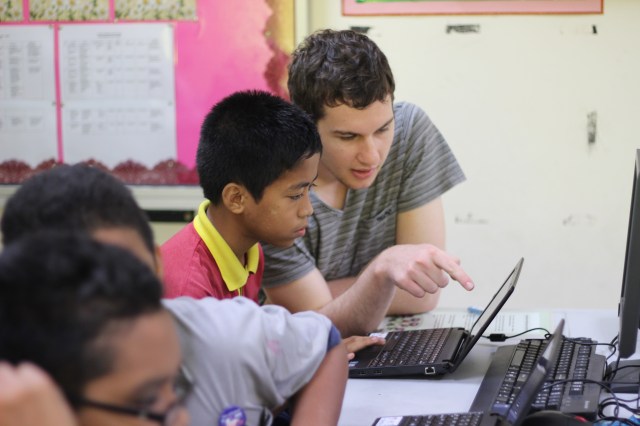 Anthony making a point to a student in Class 6 (Photo: Ibnu Isa). 