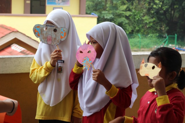Class 3 students showing off their masks
